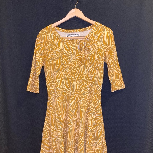 yellow fit and flare dress with sleeves